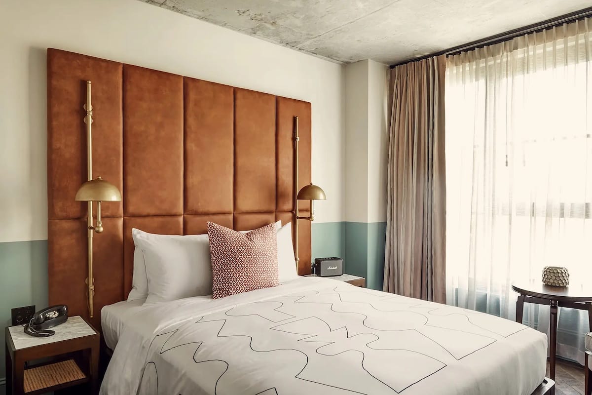 A clean, modern and contemporary bedroom inside Hoxton Chicago