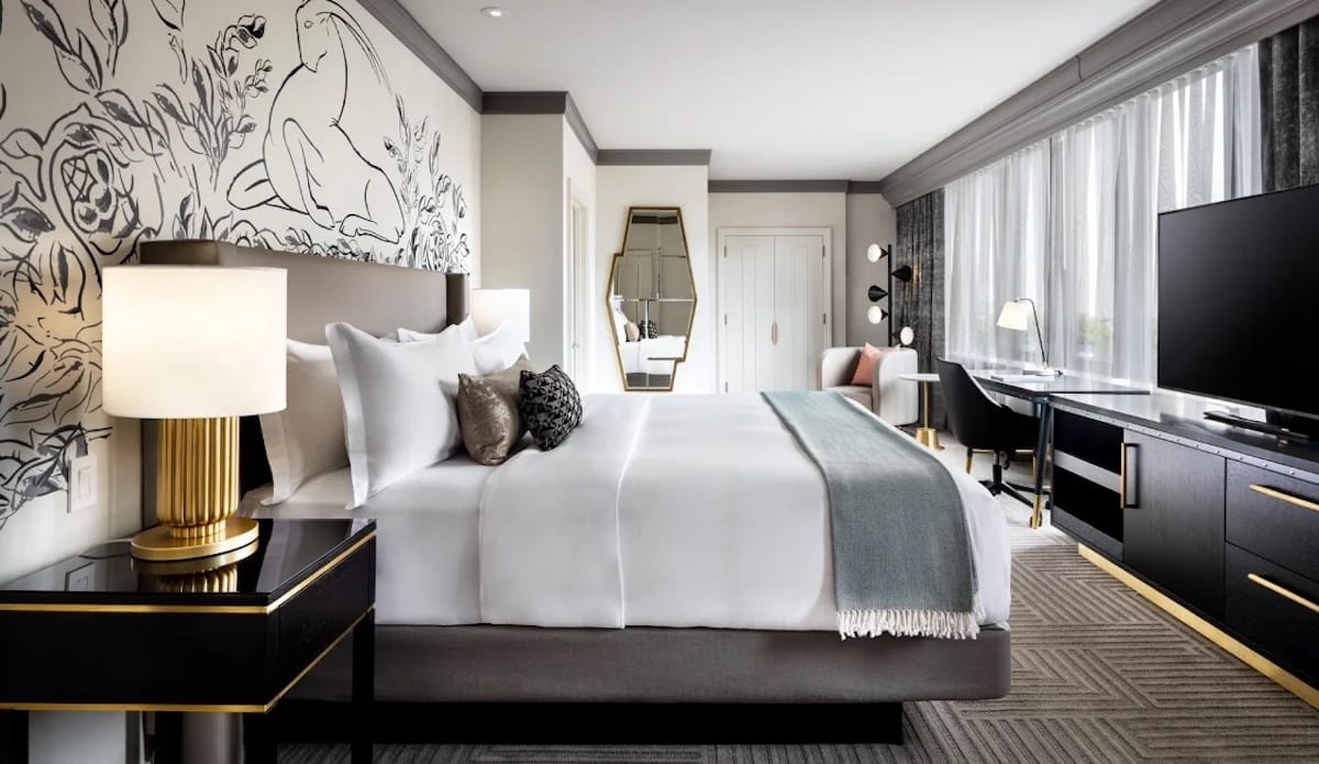 A luxury hotel room, with chic design, at The Gwen Chicago