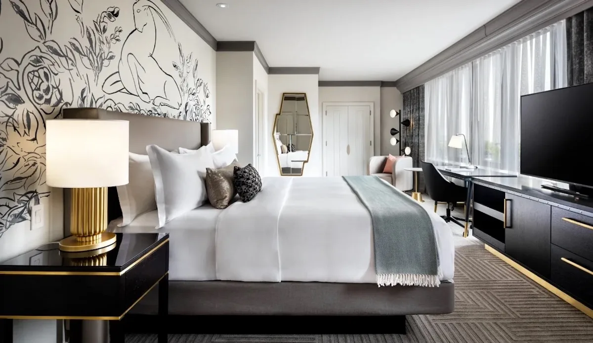 A luxury hotel room, with chic design, at The Gwen Chicago
