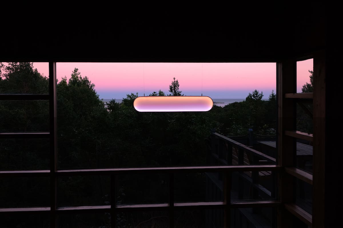 Solar Light installation - purple hue light and purple sunset