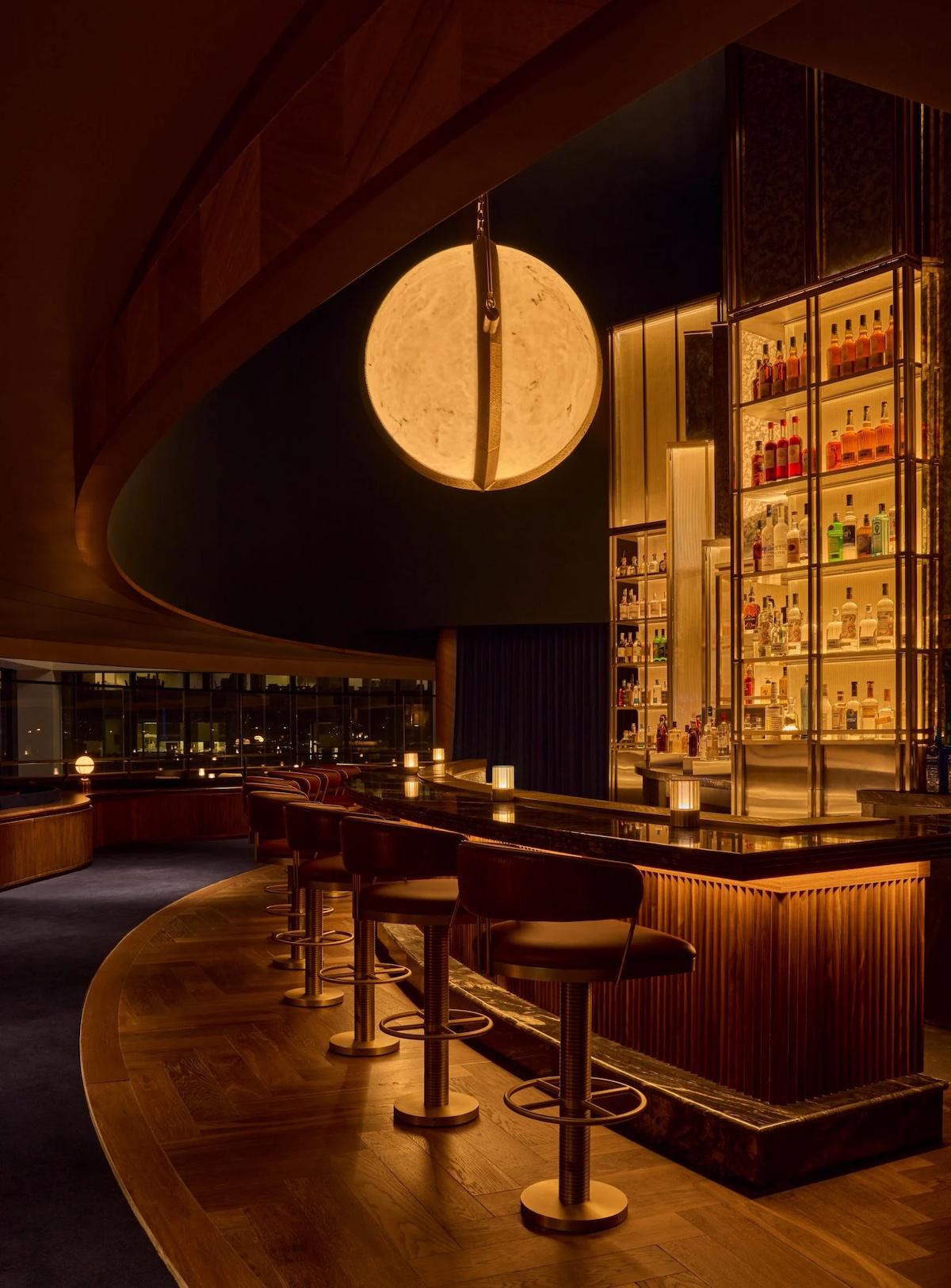 The View - designed by Rockwell Group, with large chandelier orb above bar