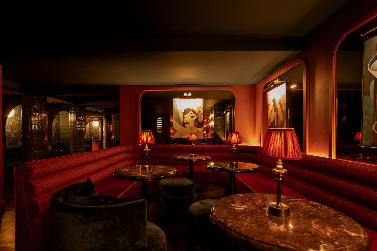 Red lounge area in Hush, the private members bar