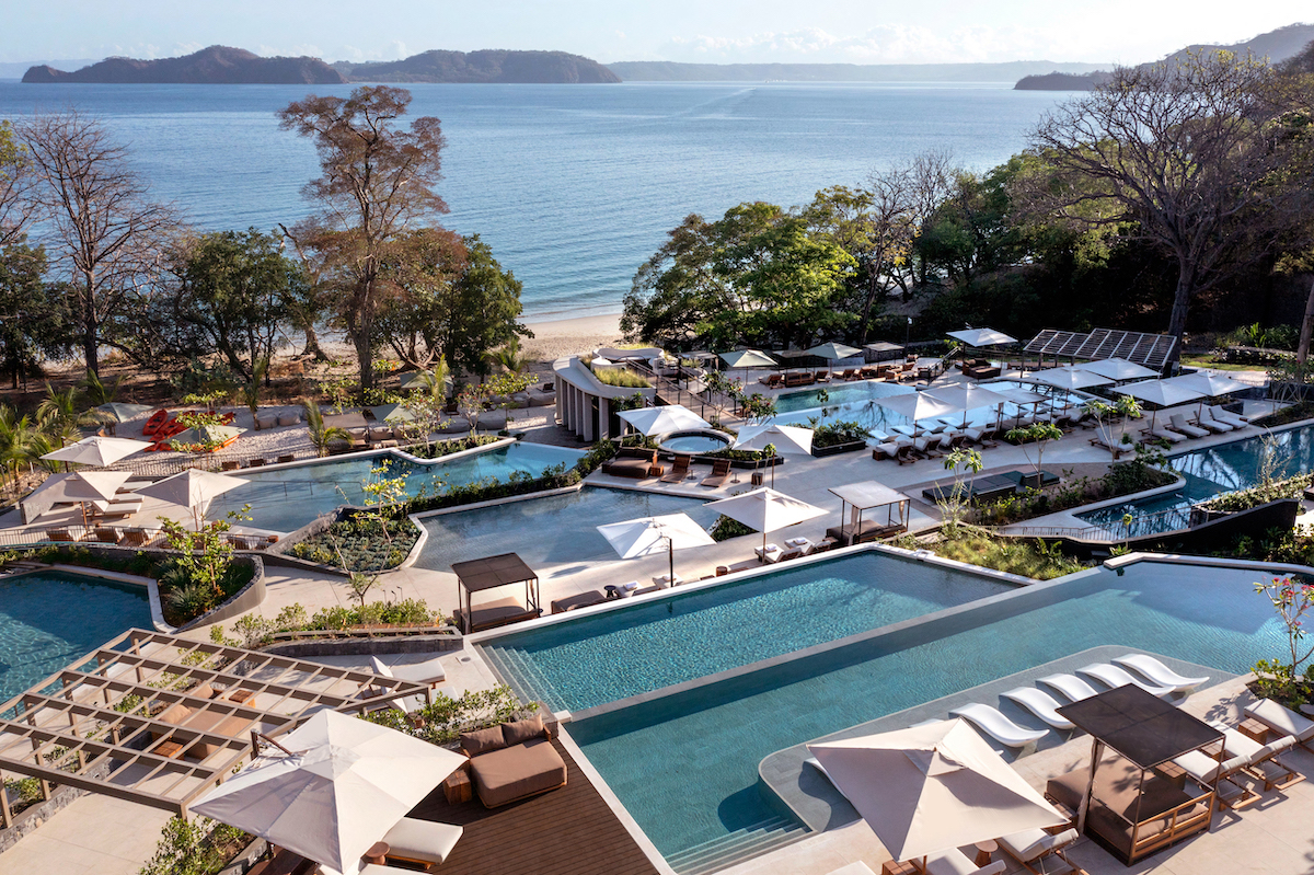 Landscape of Waldorf Astoria in Costa Rica, showing pools and sea